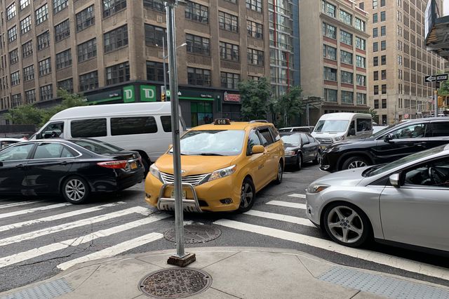 Cars are packed at an intersection in lower Manhattan